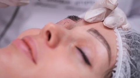 Applying pigment machine on the eyebrow. Permanent makeup. 4K Slow Mo Stock-Footage 106893452