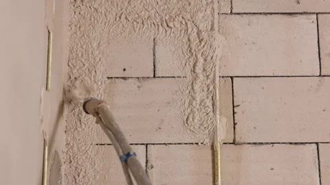 Applying plaster, Plaster hose, Wall repair Stock Footage 330012093