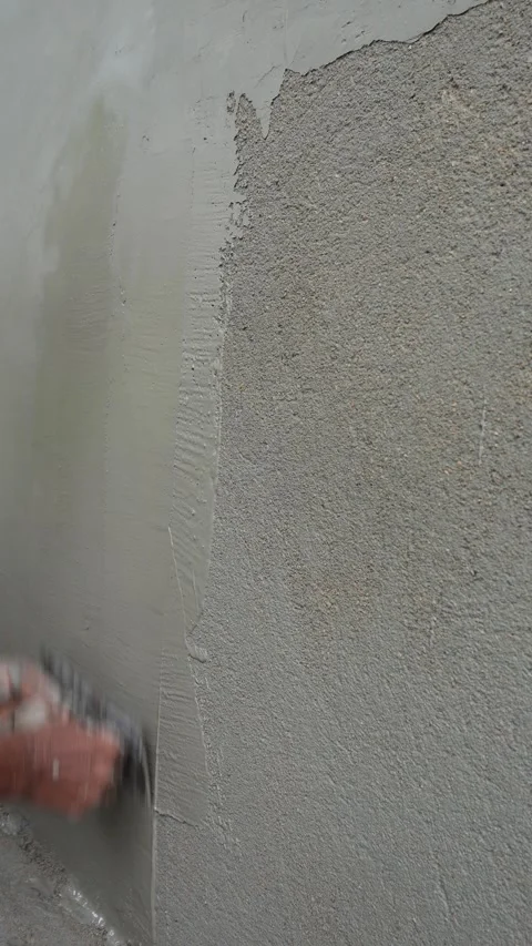 Applying Plaster with Trowel Stock Footage 340759628