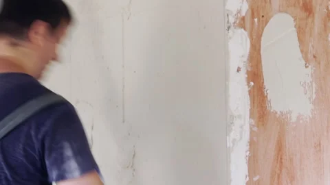 Applying plaster to the wall. Stock Footage 278523586