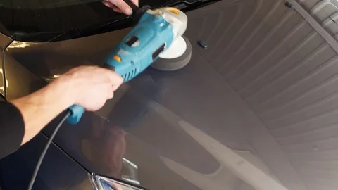 Applying polishes and rubbing Stock Footage 72113899
