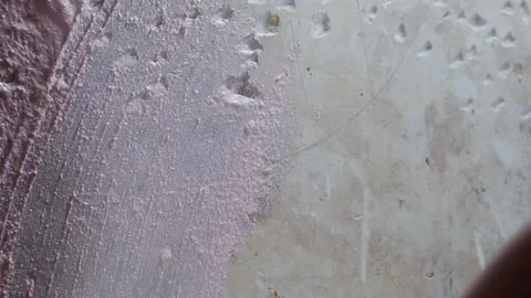 Applying the primer to the wall with a brush. Stock Footage 147183656