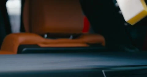 Applying Protective Cleaner to Car Trunk Mat 3 Stock Footage 293920903