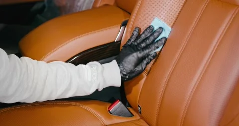 Applying Protective Coating to Luxury Car Seat 1 Stock Footage 293921273