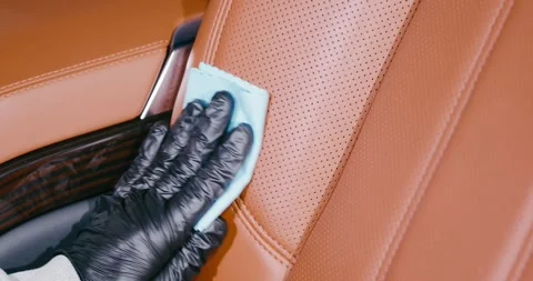 Applying Protective Coating to Luxury Car Seat 2 Stock Footage 293921409
