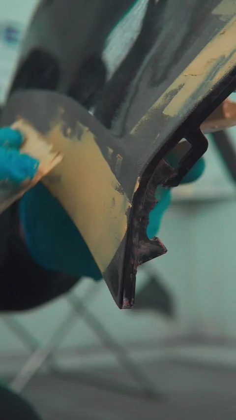 Applying putty Stock Footage 304619927