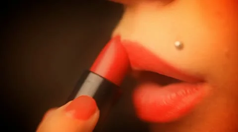 Applying red lipstick close-up shot Stock Footage 10584160