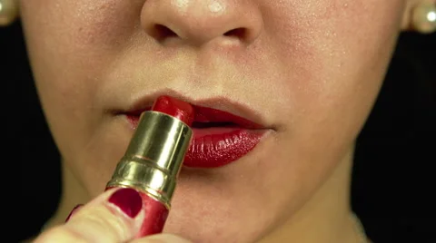 Applying Red lipstick Stock Footage 59829957