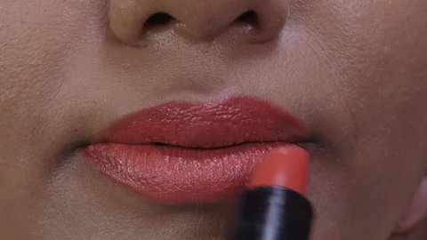 Applying Red Lipstick Video stock 128842599