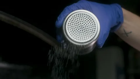 Applying salt on burger Stock-Footage 170833312