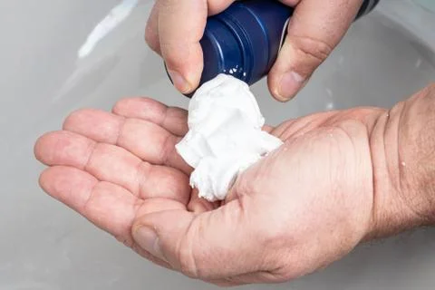 Applying shaving foam Stock Photos
