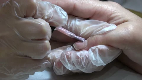 Applying shellac on the prepared nails Stock Footage 155207898
