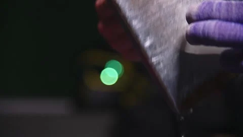 Applying Ski Wax To Ski Base with iron. Ski base tuning and paraffin bars Stock Footage 284821157