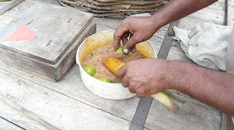 Applying Spices to Corn Video stock 556024