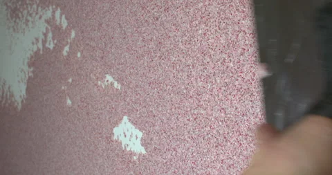 Applying textured plaster to the wall Stock Footage 306862731