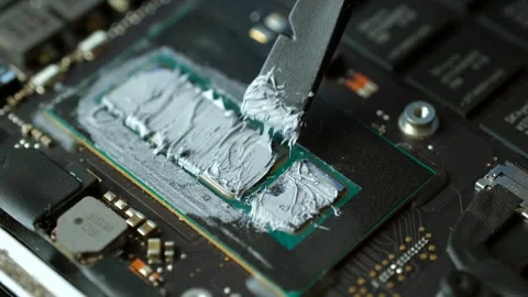 Applying thermal paste to the laptop processor. Stock Footage 279918848