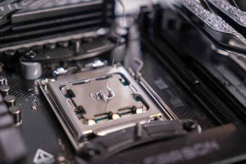 Applying thermal paste on a processor for better cooling, computer maintenanc 写真素材