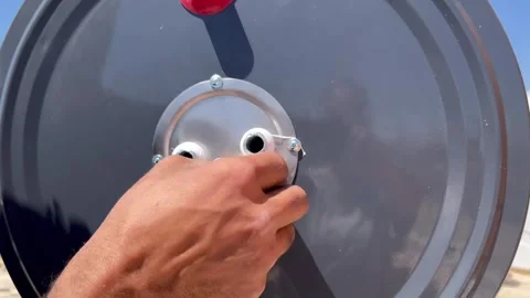 Applying Thread Seal Tape to Solar Water Heater Tank Fittings Stock Footage 345208264