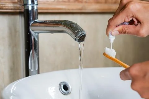 Applying Toothpaste to Bamboo Toothbrush Stock Photos