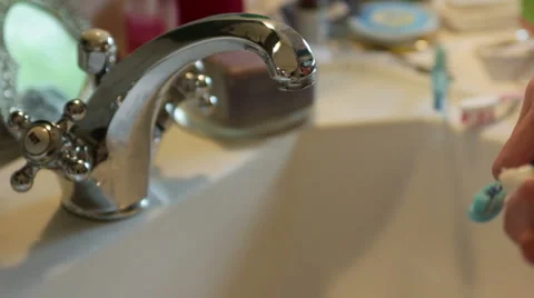 Applying toothpaste on toothbrush Stock Footage 40841832