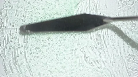 Applying transparent cleansing gel with small spatula Vídeo Stock 170551546