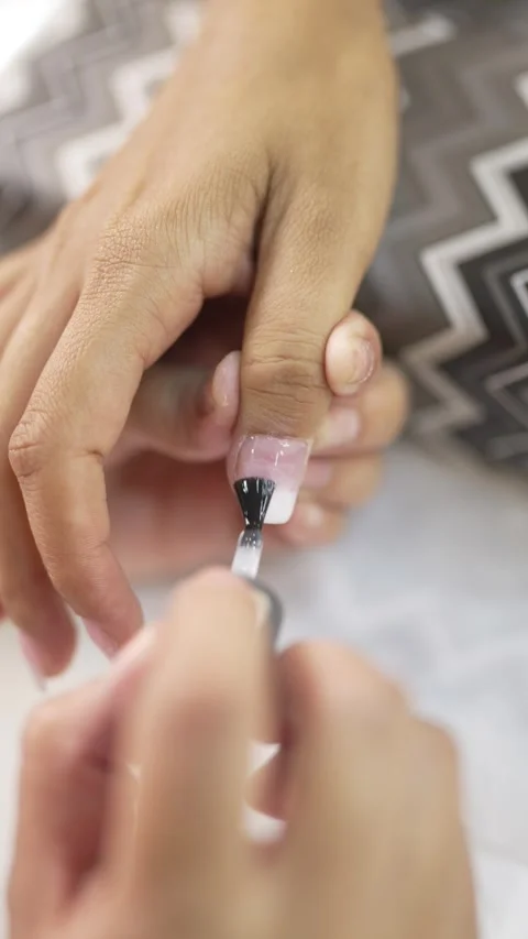 Applying Transparent Nail Polish Stock Footage 312992515