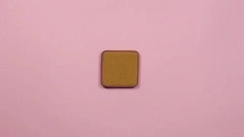 Applying violet glaze to ginger biscuits, top view 動画素材 126213546