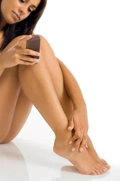 Applying wax depilatory Stock Photos