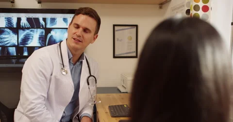 Appointment, interview and help with healthcare worker listening to patient Stock Footage 250890790