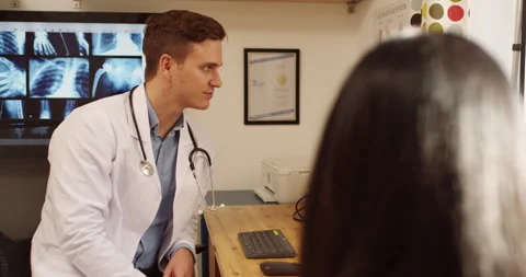 Appointment, interview and help with healthcare worker listening to patient Stock Footage 250891370