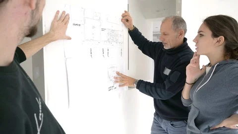 Apprentice with architect working on project Stock Footage 123215465