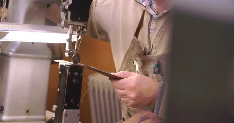 Apprentice In Bespoke Shoemaker Stitching Together Leather Stock-Footage 53516943