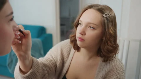 Apprentice Carefully Designs Eye Makeup Details, Young Makeup Student Stock-Footage 327021928