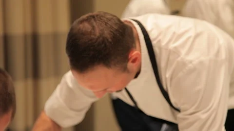 Apprentice chiefs preparing dishes 動画素材 63598870