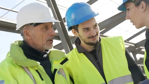 Apprentice with instructor on building site Stock Footage 123215900