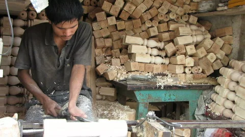 Apprentice working a lathe  Stock Footage 522279