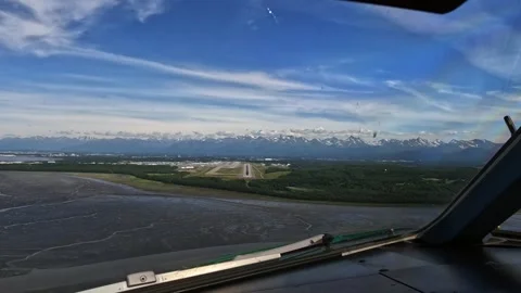 Approach and go around from Pilots point of view (POV) at Ted Stevens Anchorage  Stock Footage 344863855