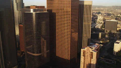Approach and left-to-right flight past downtown Los Angeles skyscrapers. Shot in Stock Footage 59526044