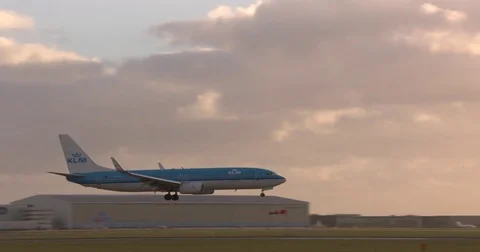 Approach and touch down aircraft KLM  - tracking shot Stock Footage 73403302