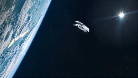 Approach of asteroid to the Earth. Asteroid falling on Earth. View from space Stock Footage 253819912