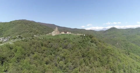 Approach to monastery with snow mountains on background. 426 14116 09 2 Stock Footage 130546225