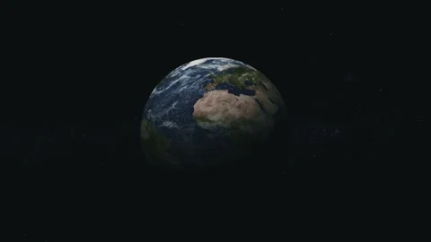 An approach to the planet Earth emerging from the shadows 動画素材 348647058