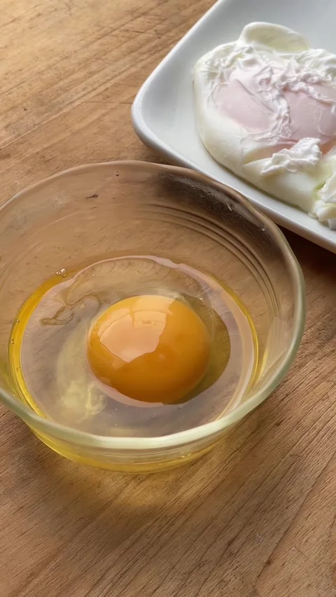 Approach to a raw egg Stock Footage 288255806