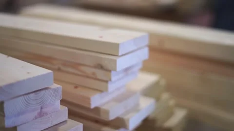 Approach Shot Toward Large Pile of Cut Wood Awaiting Processing at Lumberyard Video stock 307377720