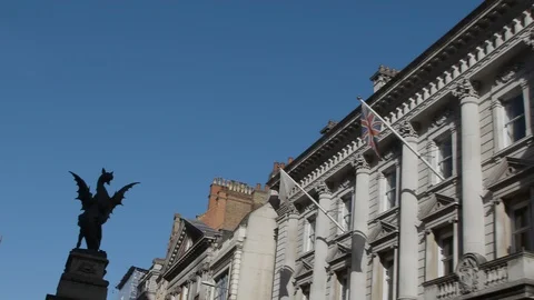 Approach on silhouetted dragon statue Stock Footage 124230879