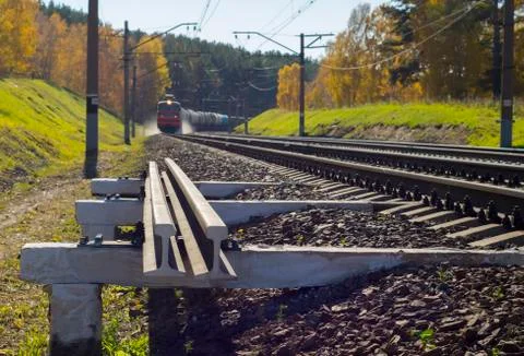 Approach of a train with steam Stock Photos