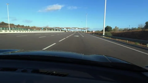Approaching and Passing Through Highway Toll Plaza on Portuguese Motorway J.. Stock Footage 309293691