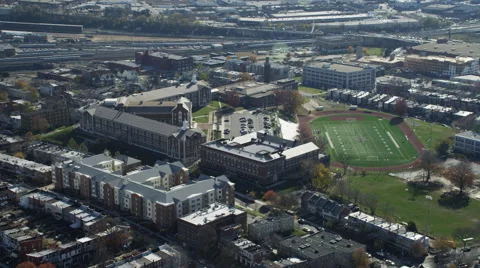 Approaching and rotating over McKinley Technology High School and Langley Junior Stock Footage 59209848