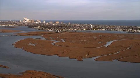 Approaching Atlantic City New Jersey from marshland in west. Shot in November Stock Footage 59217573