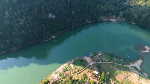 Approaching Ban Sop Jam via Nam Ou River  Cinematic Drone Shot in Laos Stock Footage 312519784
